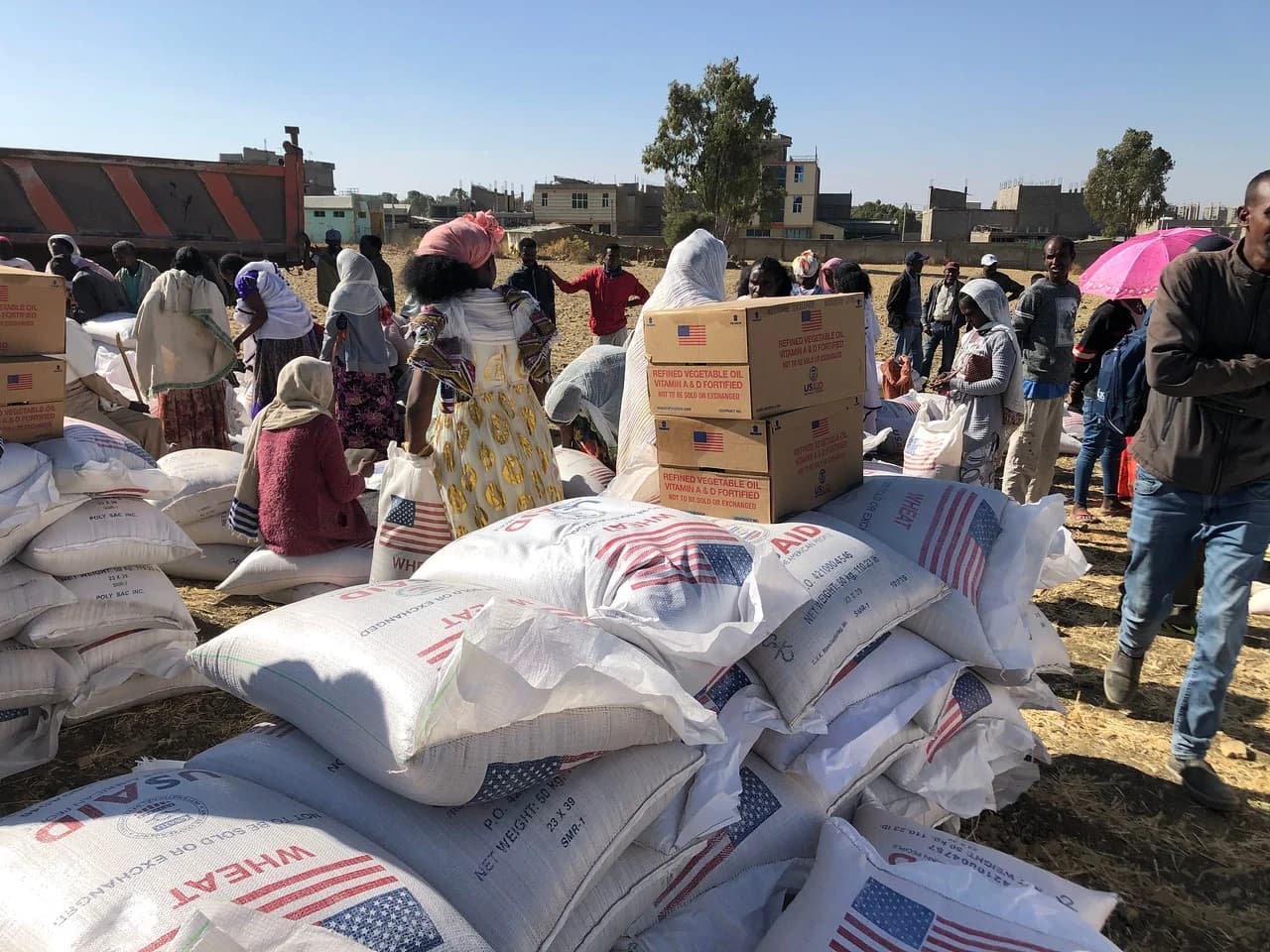 Food sacks and oil cartons during an aid distribution in Tigray, archive photograph from 2021
